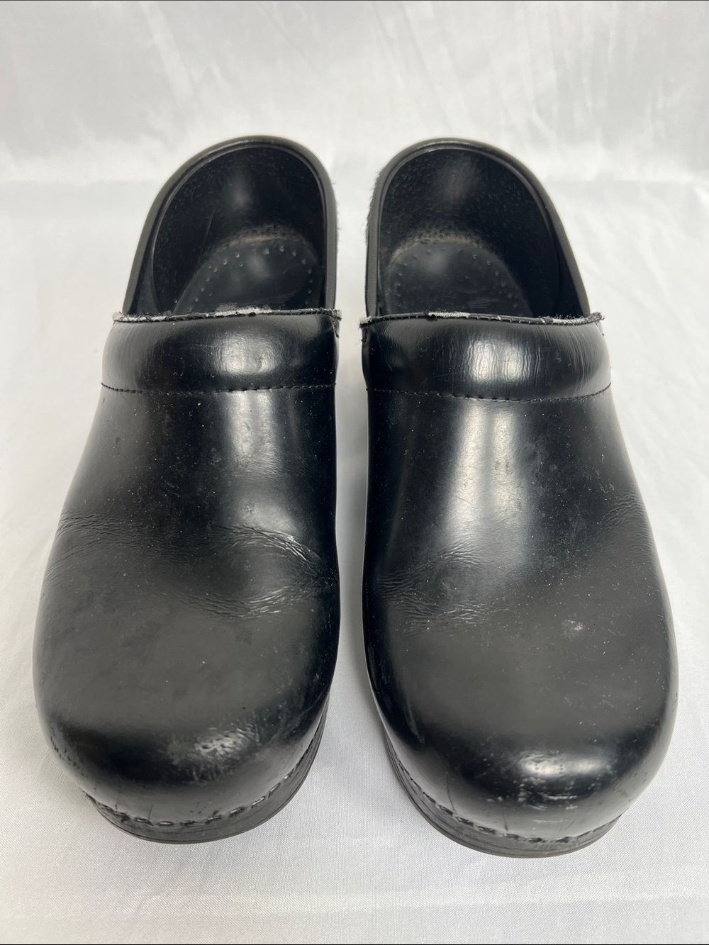 Dansko Black Leather Slip-On Clogs for Men